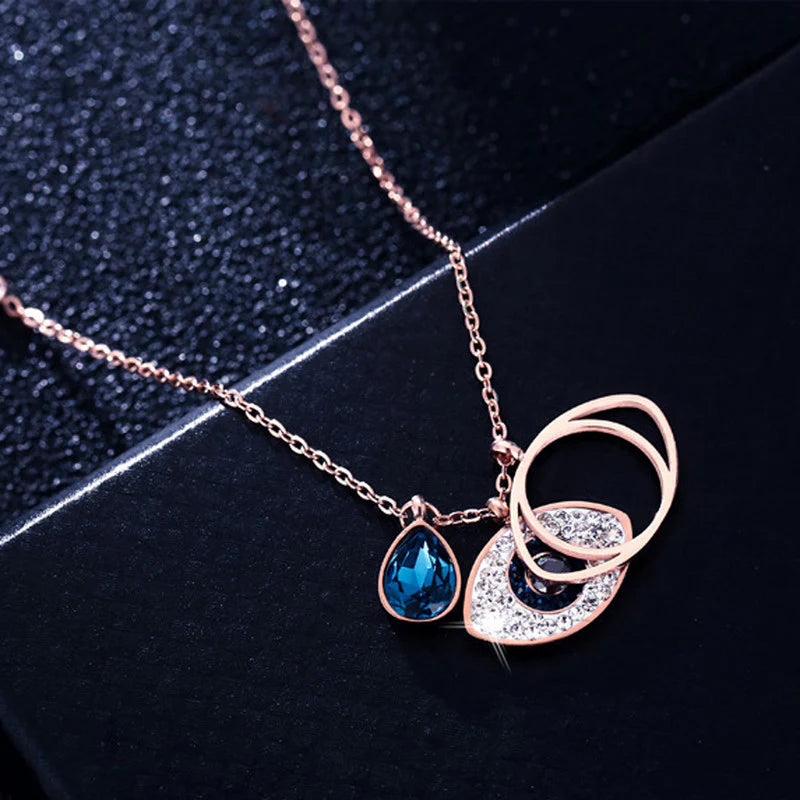 Rose Gold Plated Stainless Steel Evil Eye Pendant Necklace with American Diamonds - OSL-126